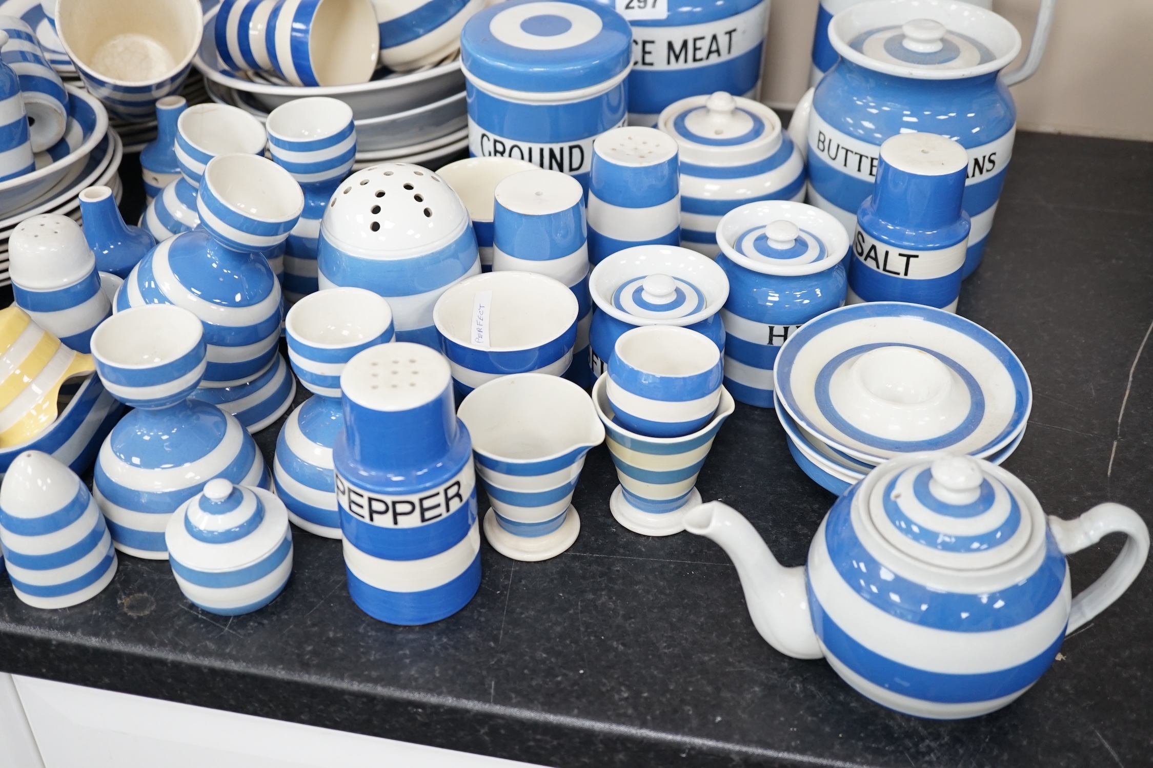A quantity of unmarked and non T.G.Green blue and white Cornishware to include a Mincemeat jar and cover, egg cups, bowls, dishes and sifters, approximately eighty pieces. Condition - fair to good